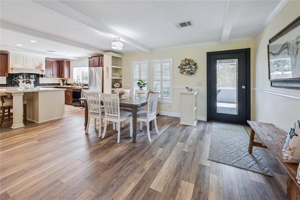 1175 Southwest 248th Avenue Steinhatchee, FL 32359 - Photo 28 of 54 a living room with furniture and wooden floor