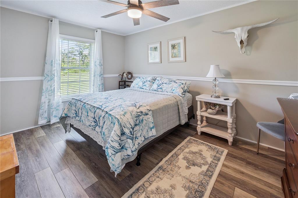 1175 Southwest 248th Avenue Steinhatchee, FL 32359 - Photo 37 of 54 a bedroom with a bed and a window