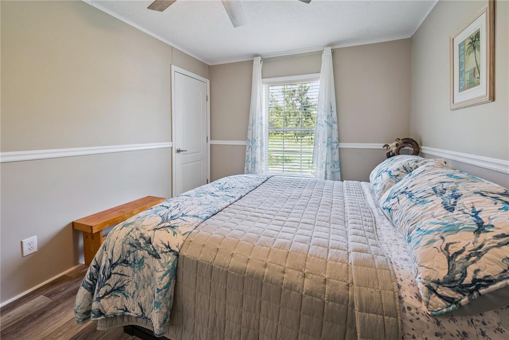 1175 Southwest 248th Avenue Steinhatchee, FL 32359 - Photo 38 of 54 a bedroom with a bed and a window