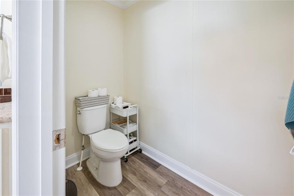 1175 Southwest 248th Avenue Steinhatchee, FL 32359 - Photo 45 of 54 a white toilet sitting next to a white wall