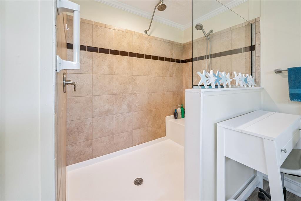 1175 Southwest 248th Avenue Steinhatchee, FL 32359 - Photo 46 of 54 a bathroom with a shower and a sink