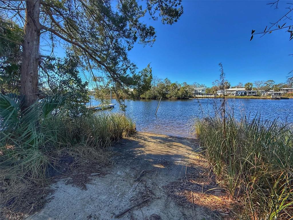 1175 Southwest 248th Avenue Steinhatchee, FL 32359 - Photo 50 of 54 a view of a lake with sitting area