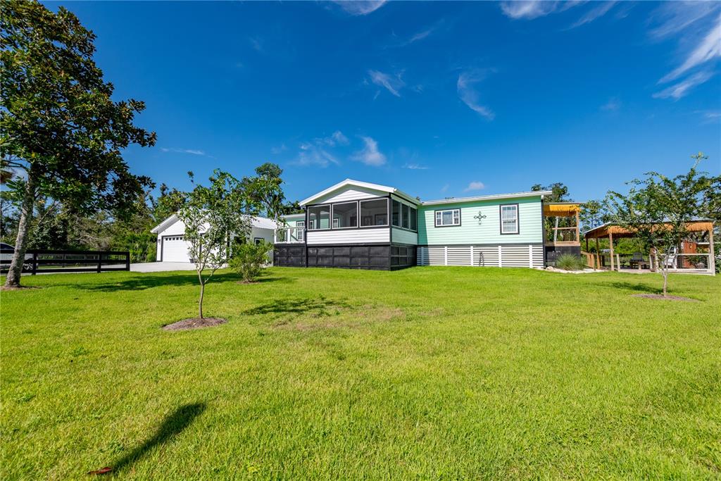 1175 Southwest 248th Avenue Steinhatchee, FL 32359 - Photo 5 of 54 a house view with a garden space