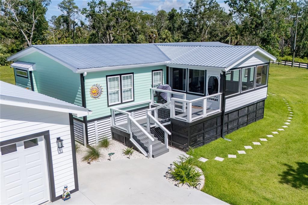 1175 Southwest 248th Avenue Steinhatchee, FL 32359 - Photo 6 of 54 a aerial view of a house with a yard
