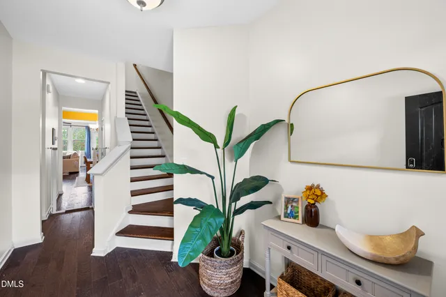 a view of entryway with wooden floor