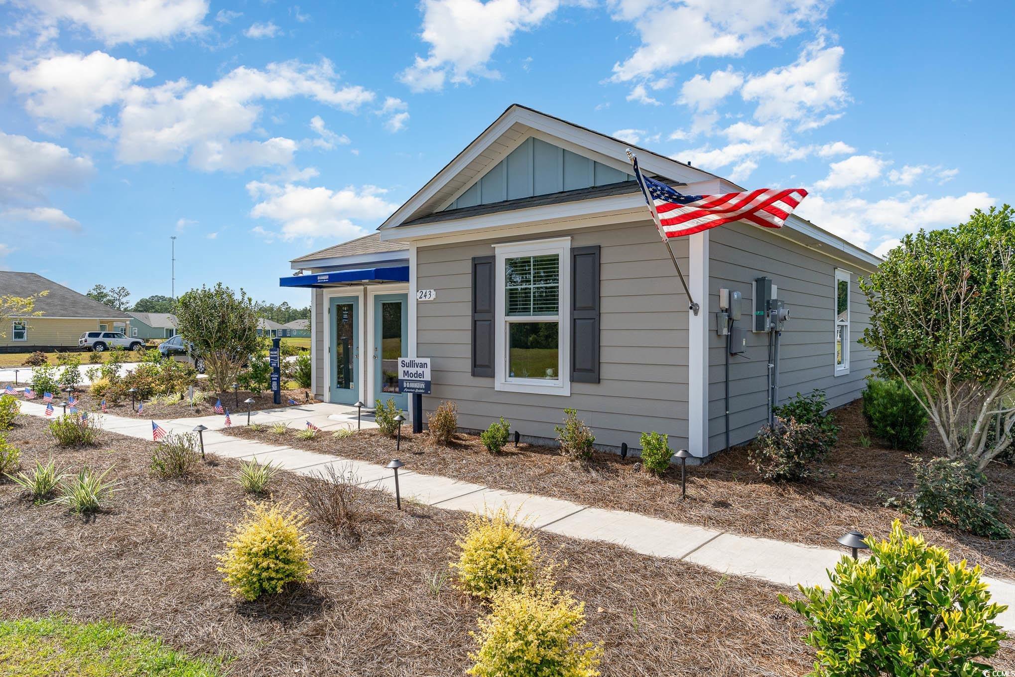 Bungalow-style home featuring board and batten siding