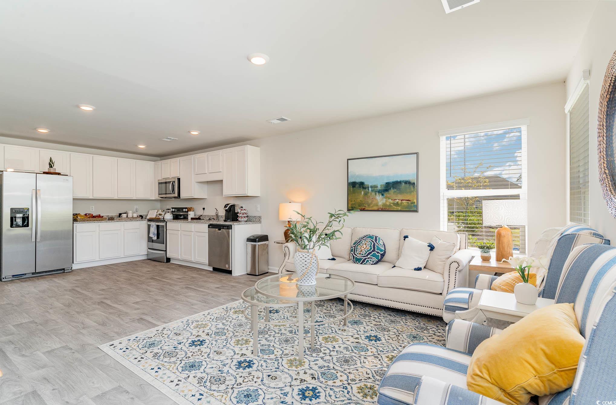 243 Teddy Bear Loop Conway, SC 29526 - Photo 13 of 24 Living area featuring light wood-type flooring and recessed lighting