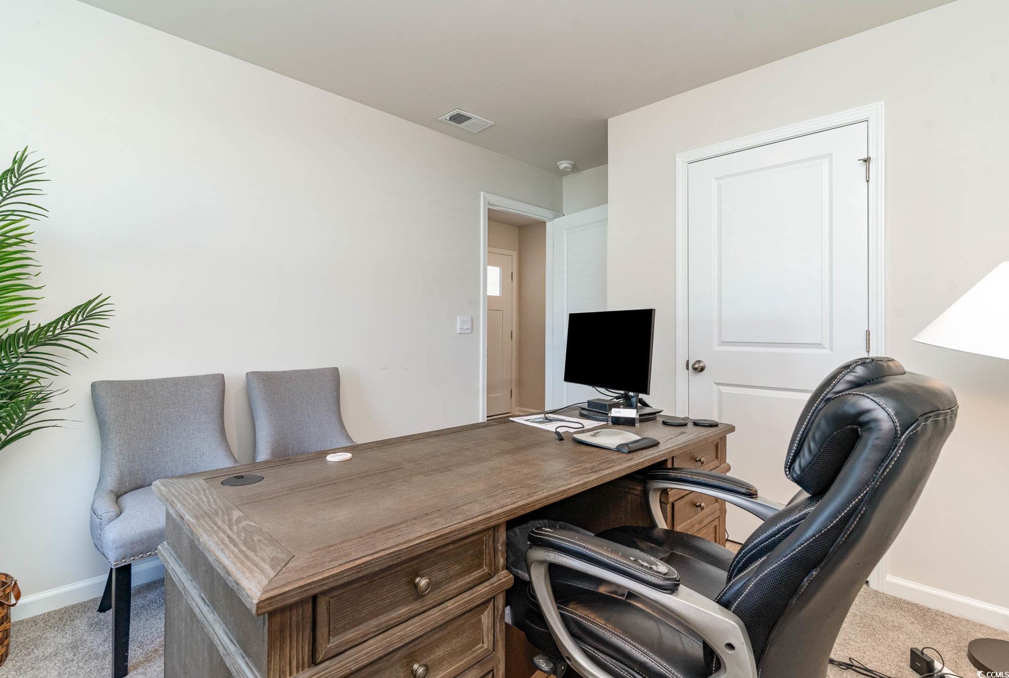 243 Teddy Bear Loop Conway, SC 29526 - Photo 23 of 24 Home office featuring baseboards and light carpet