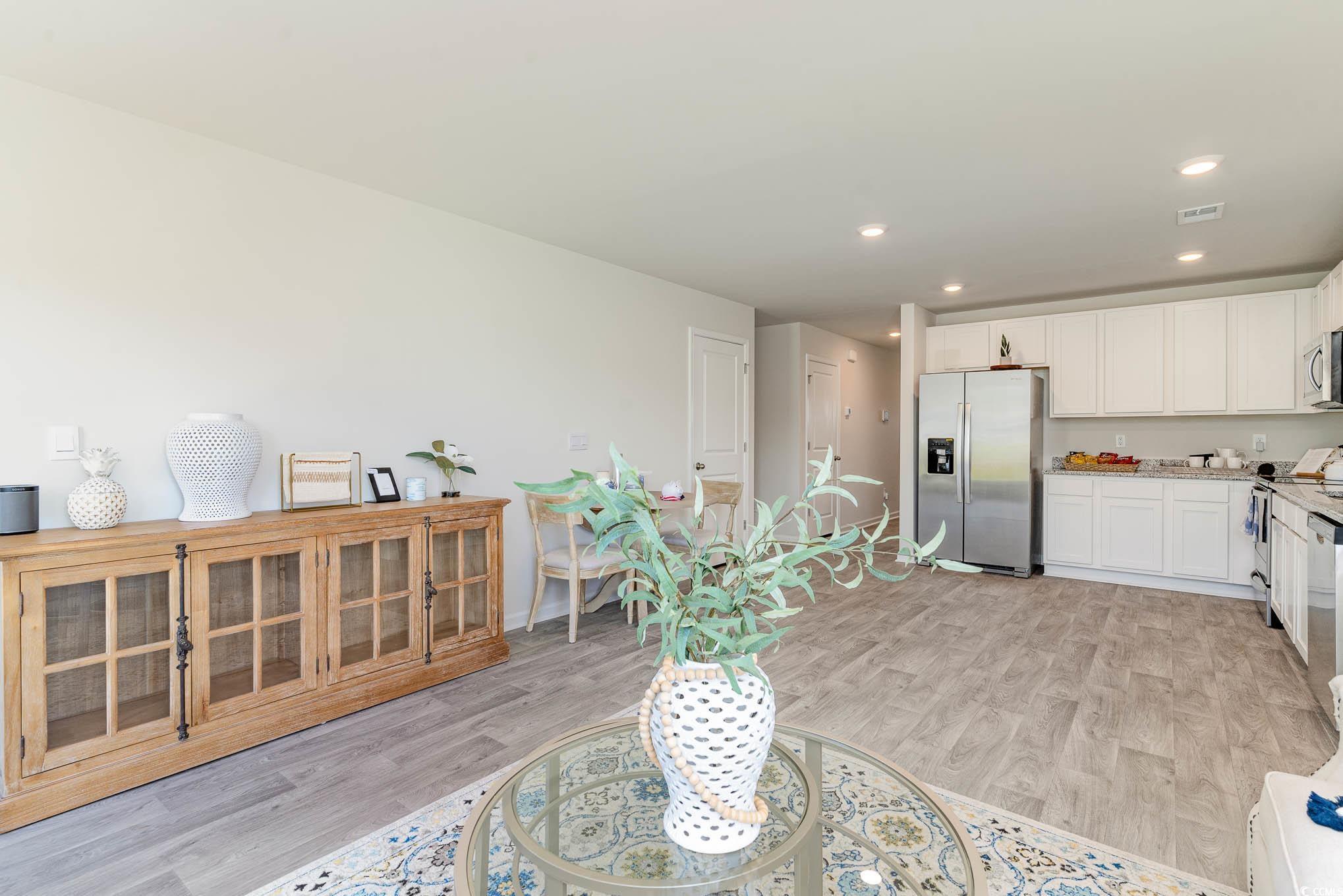 243 Teddy Bear Loop Conway, SC 29526 - Photo 9 of 24 Kitchen with white cabinets, stainless steel appliances, light wood-style flooring, and recessed lighting