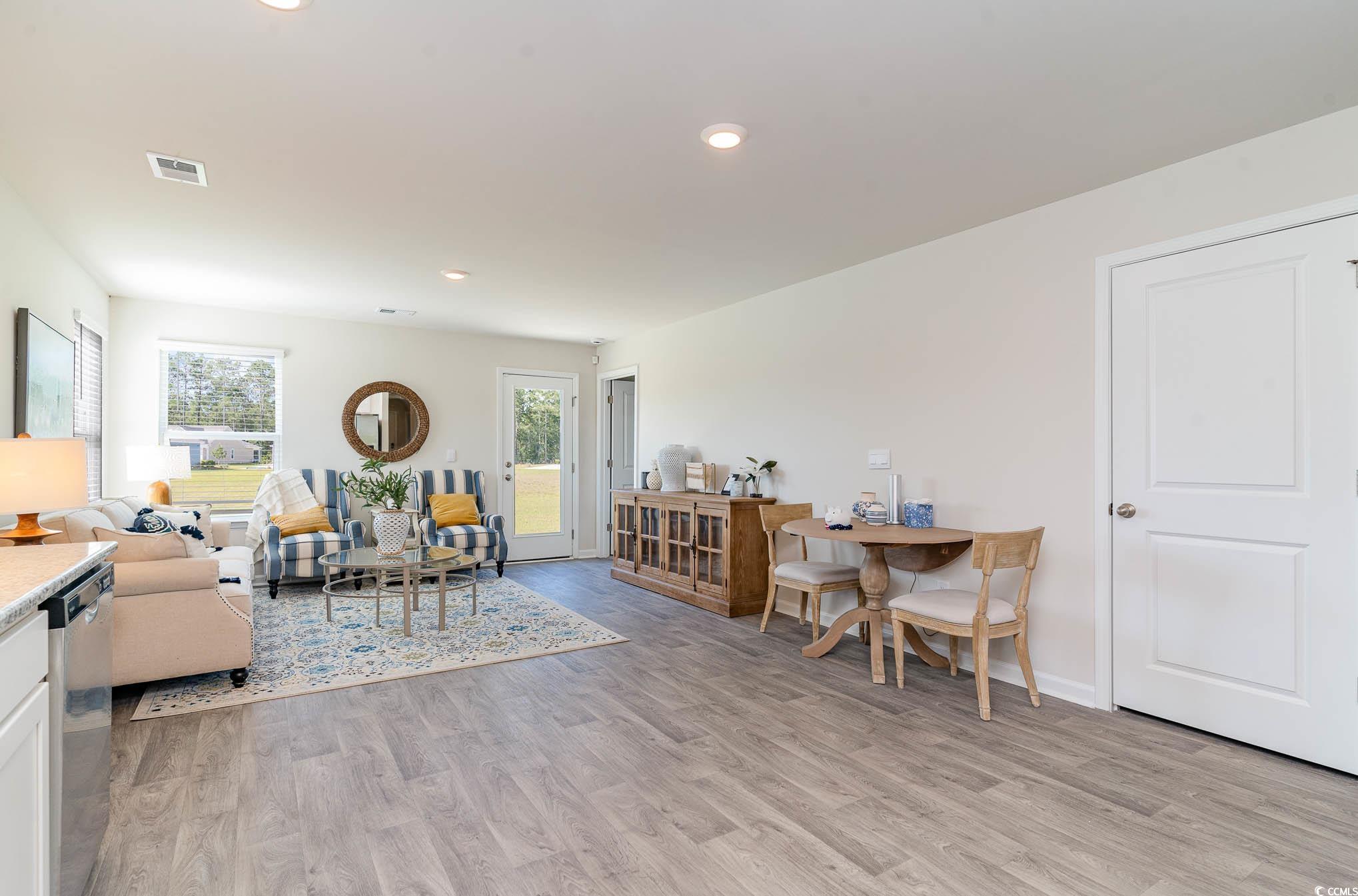 243 Teddy Bear Loop Conway, SC 29526 - Photo 10 of 24 Living room with light wood finished floors and recessed lighting
