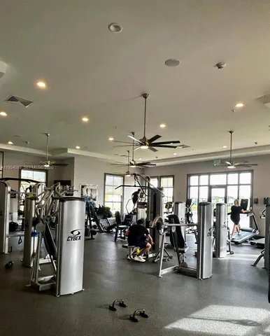 a bedroom with toys and wooden floor