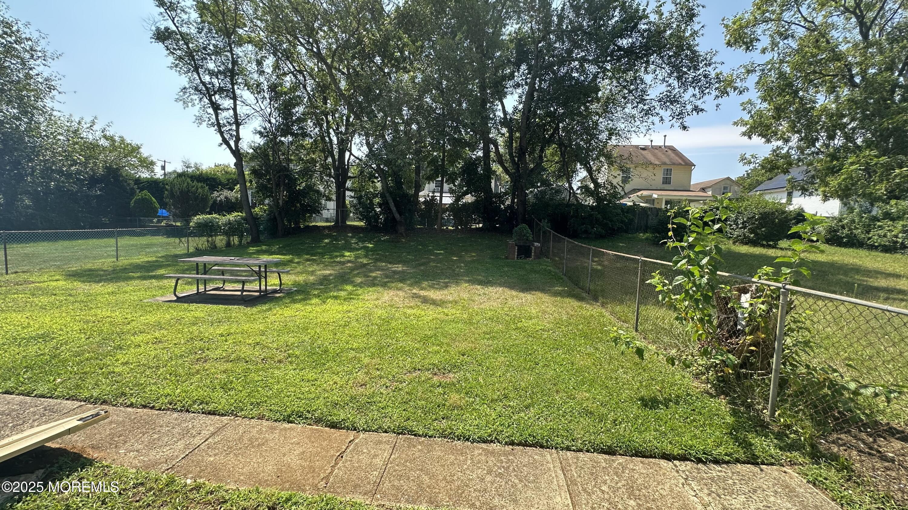 36 Liberty Street Freehold, NJ 07728 - Photo 15 of 20 a view of a park with large trees