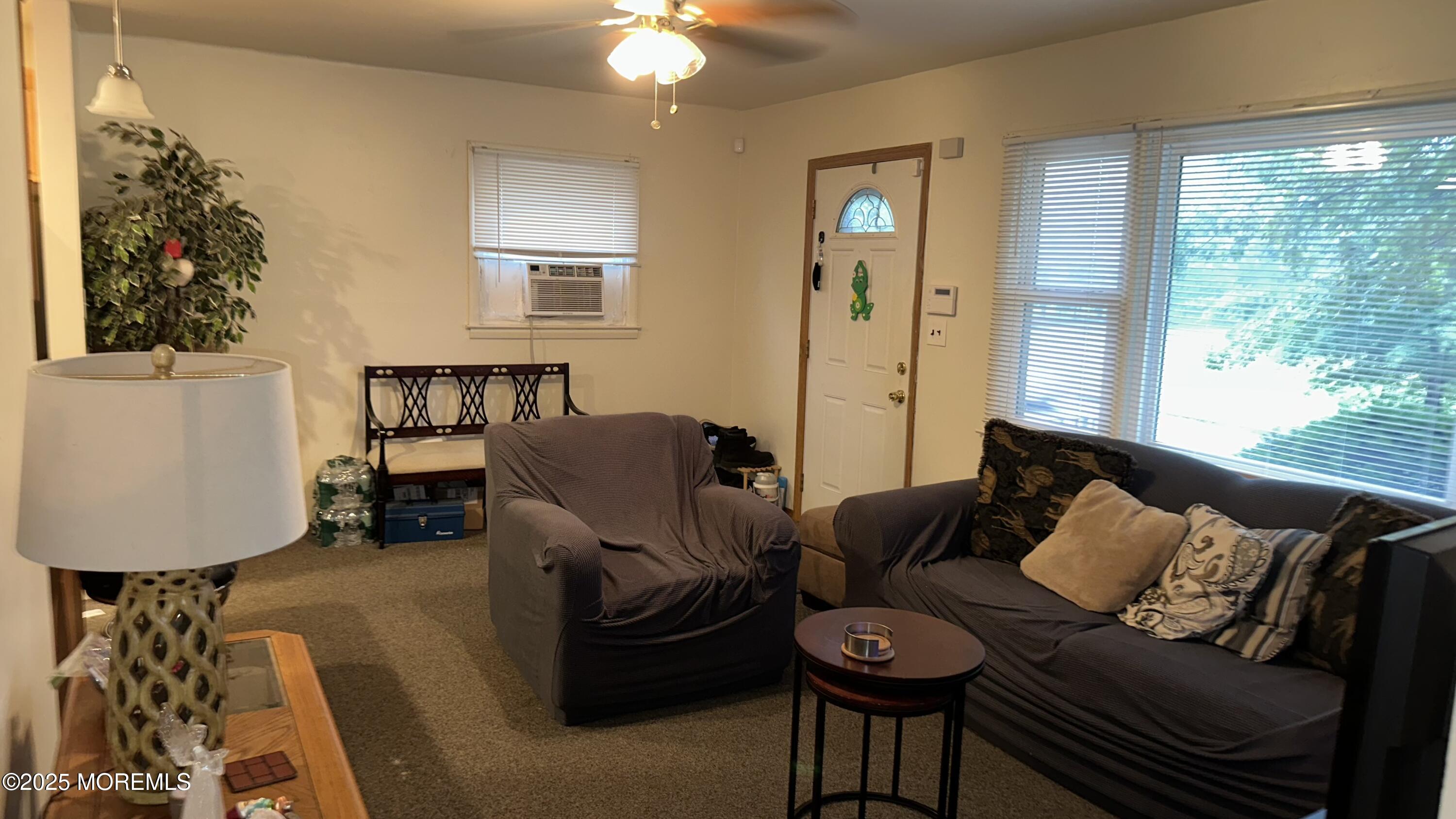 36 Liberty Street Freehold, NJ 07728 - Photo 9 of 20 a living room with furniture and a window
