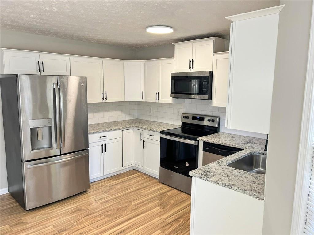 569 Pine Ridge Trail Southeast, Conyers, GA 30094 Compass