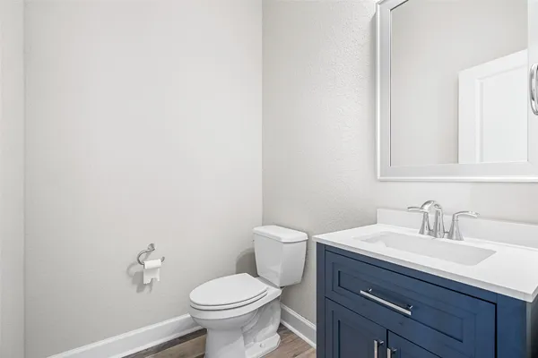 a bathroom with a sink and a toilet