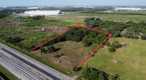 a view of a lake with a park