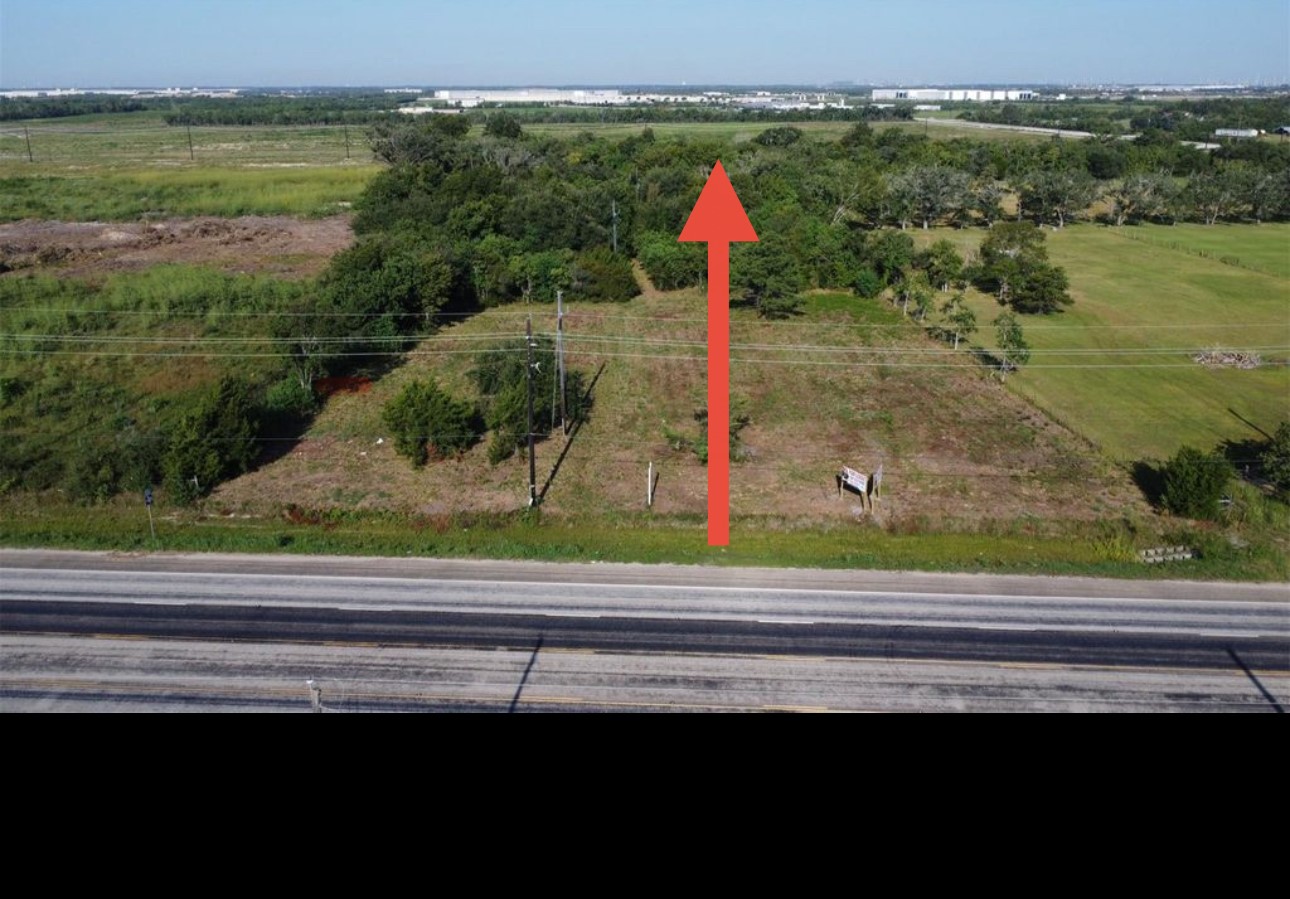 Tbd Tbd Fm-3180 Baytown, TX 77523 - Photo 2 of 6 a small pool with some trees in the background