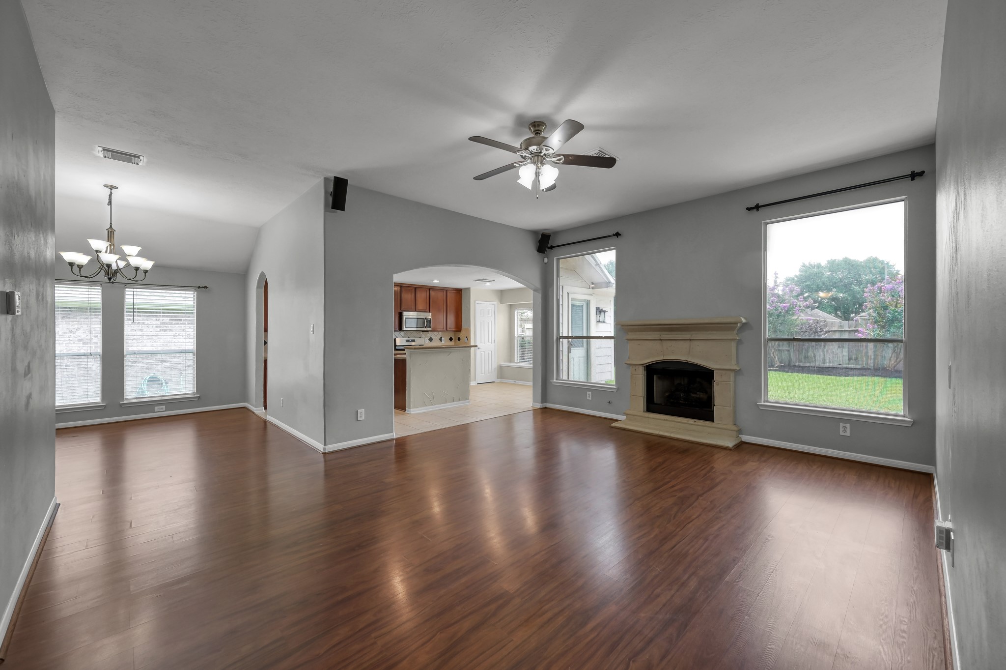 21331 Timber Pines Drive Spring, TX 77388 - Photo 22 of 22 A semi-open floor plan is perfect for everyday living or entertaining in grand style! Beautiful flooring flows from the family room into the formal dining space creating a seamless look!