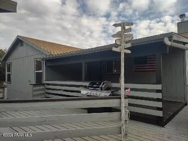 a backyard of a house with dishwasher and white walls