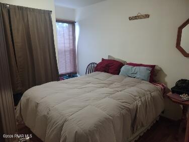 16432 Incline Trail Williams, AZ 86046 - Photo 22 of 62 a bedroom with a bed and a window