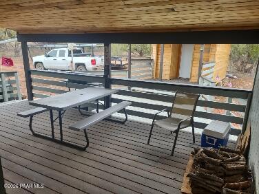 16432 Incline Trail Williams, AZ 86046 - Photo 6 of 62 a living room with a table tennis table and floor to ceiling window