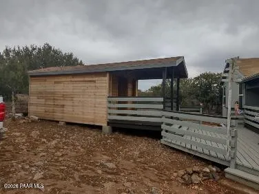 a view of backyard with green space
