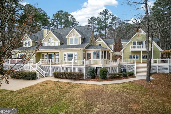 a bathroom with a sink toilet and mirror