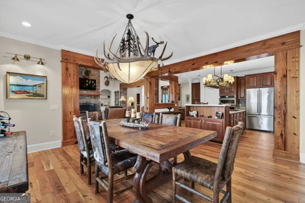 a view of a balcony with wooden floor and fence