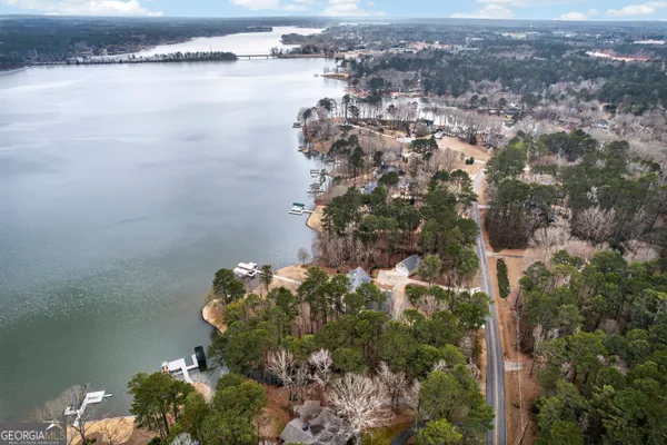 a view of a park with swings and slides