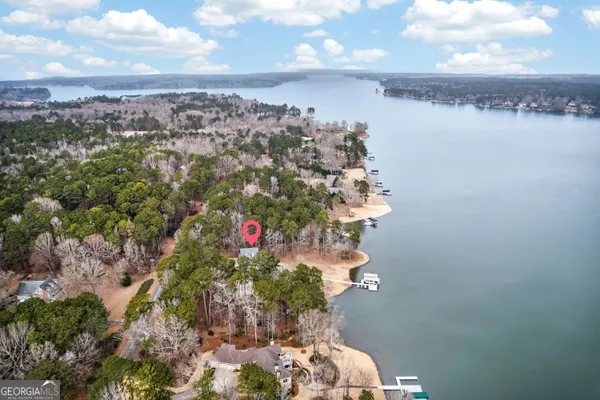 a row of palm trees in front of building