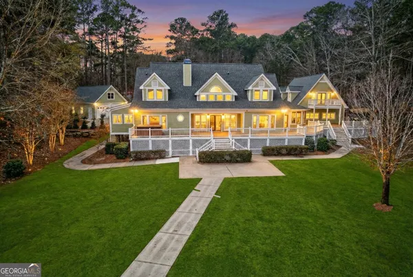 a lobby with furniture and floor to ceiling window