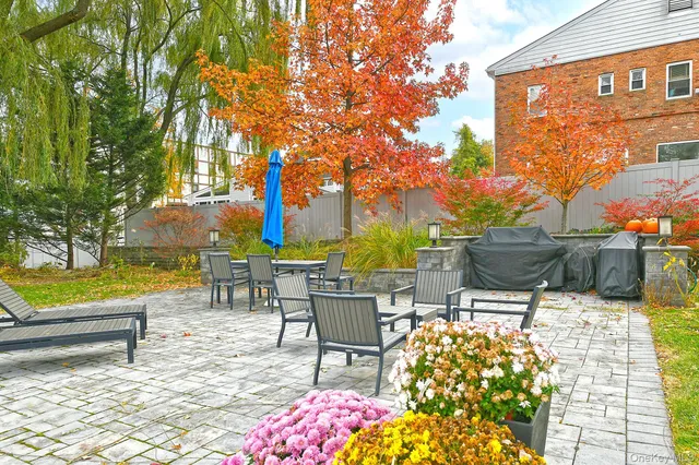 a view of a patio with swimming pool