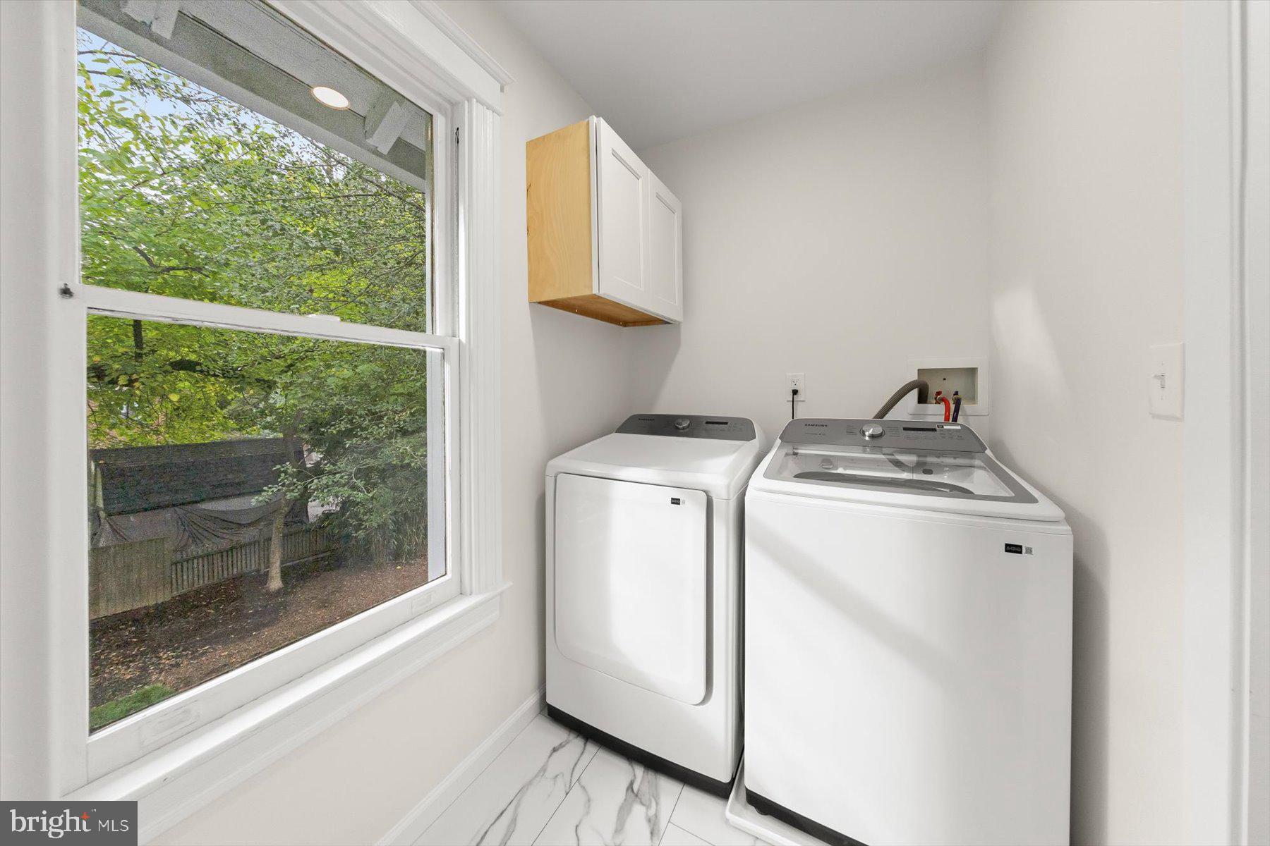 10220 Capitol View Avenue Silver Spring, MD 20910 - Photo 45 of 66 a utility room with dryer and washer