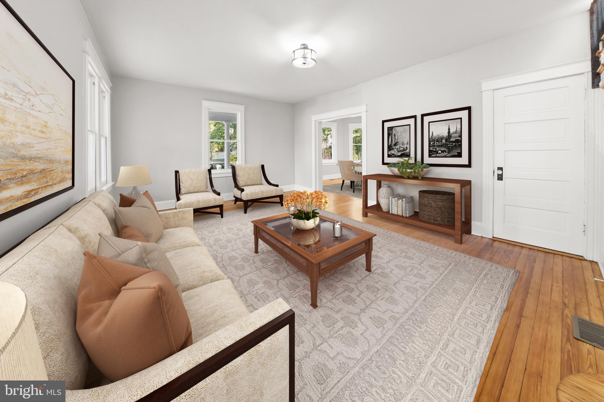 10220 Capitol View Avenue Silver Spring, MD 20910 - Photo 10 of 66 a living room with furniture and a fireplace
