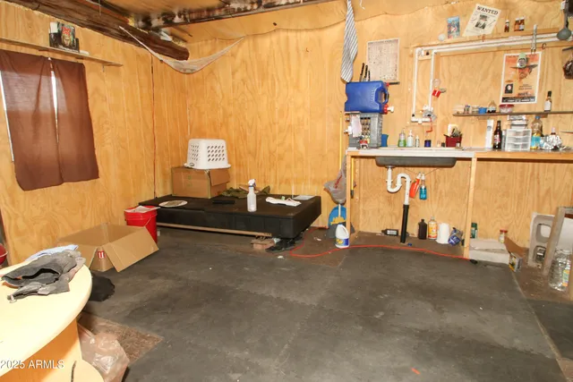 a room with table and chairs