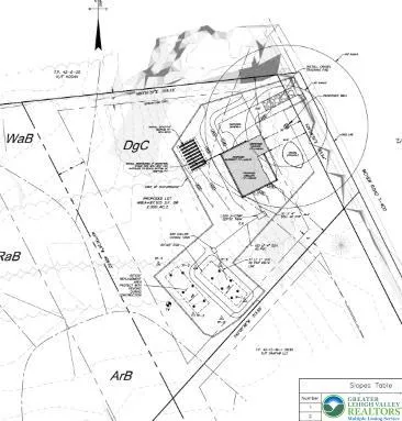 a picture of white wall with black and white umbrella