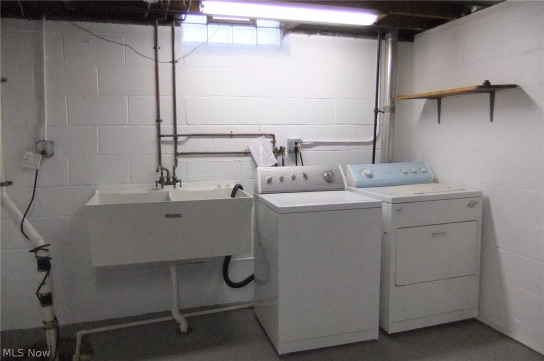 6224 Highland Road Cleveland, OH 44143 - Photo 13 of 16 Washer & dryer remain in utility room.