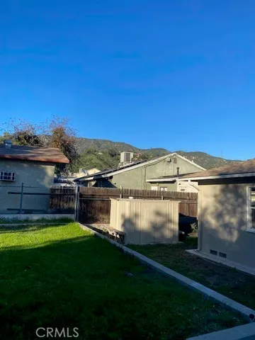 a view of outdoor space and yard