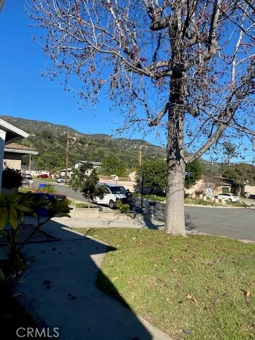 a view of a yard with an outdoor space
