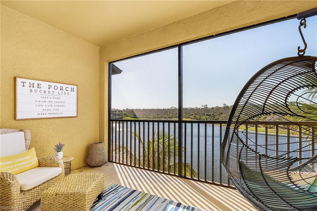 9731 Acqua Court, Unit 543 Naples, FL 34113 - Photo 18 of 24 a view of balcony with furniture