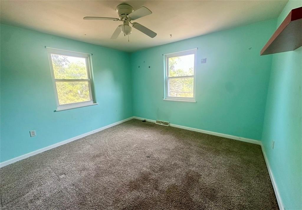 467 Big Knob Road Rochester, PA 15074 - Photo 12 of 12 a view of an empty room with a window