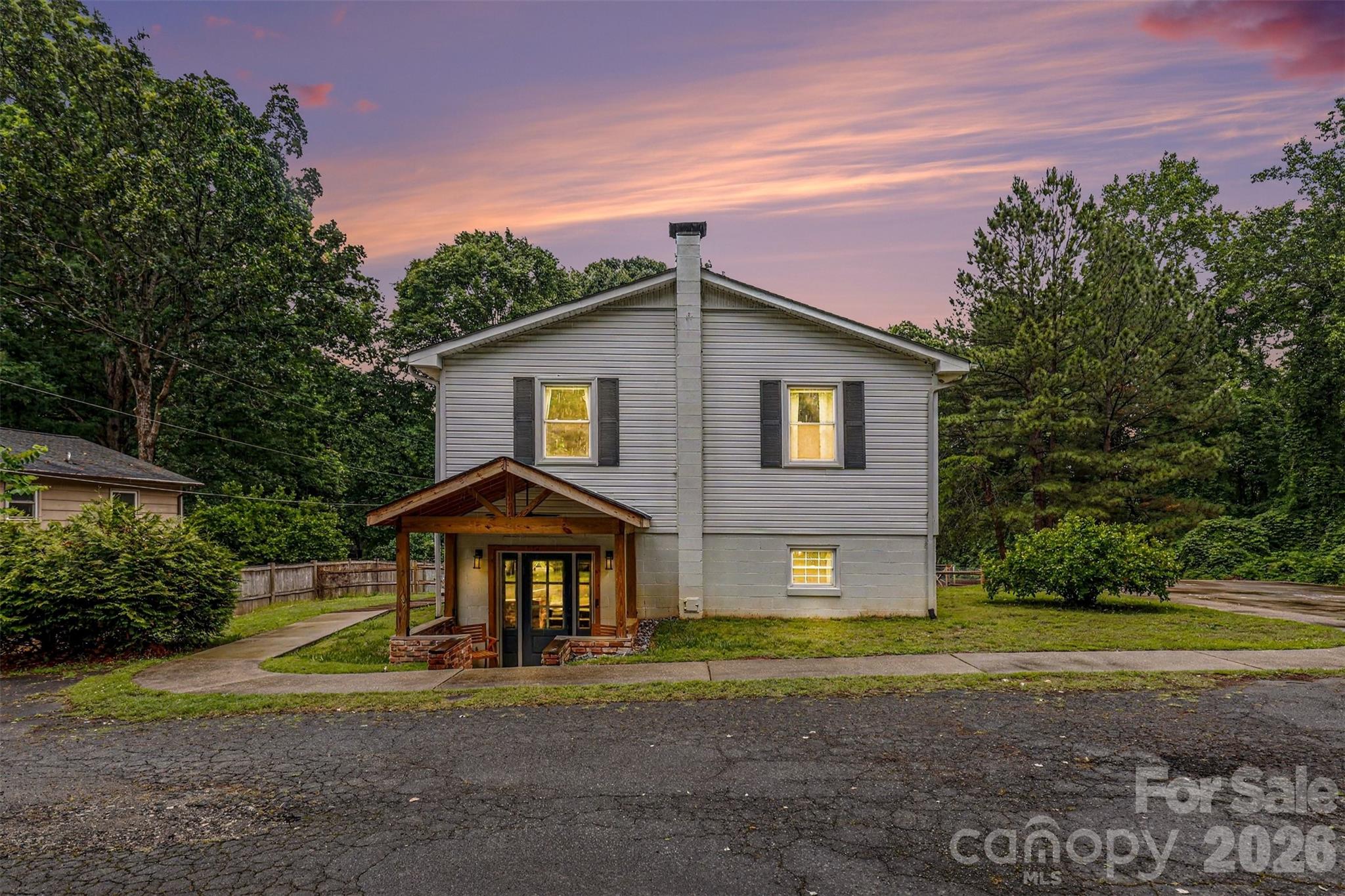 184 Canal Road Belmont, NC 28012 - Photo 1 of 39 a front view of a house with a yard