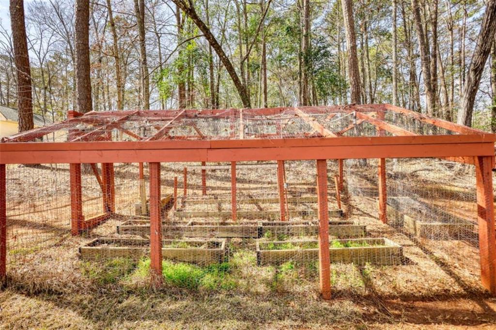 255 Old Hardy Farm Road Jackson, GA 30233 - Photo 13 of 78 a view of a backyard of the house