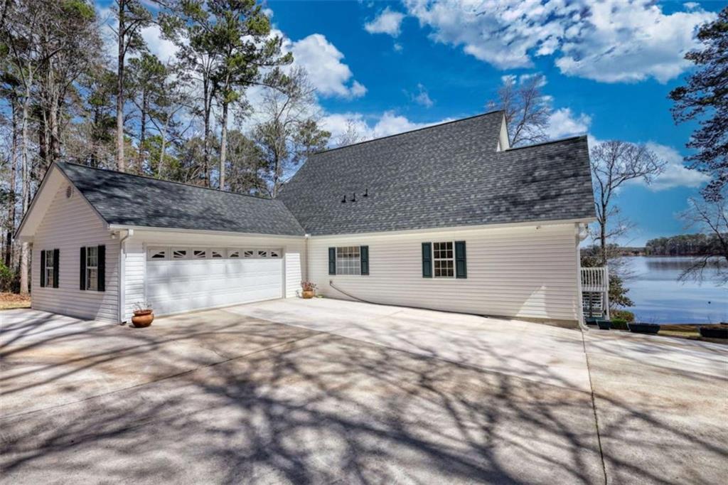 255 Old Hardy Farm Road Jackson, GA 30233 - Photo 16 of 78 a view of a house with a yard
