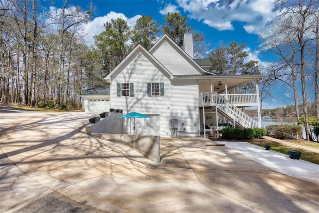 255 Old Hardy Farm Road Jackson, GA 30233 - Photo 19 of 78 a view of a house with a yard