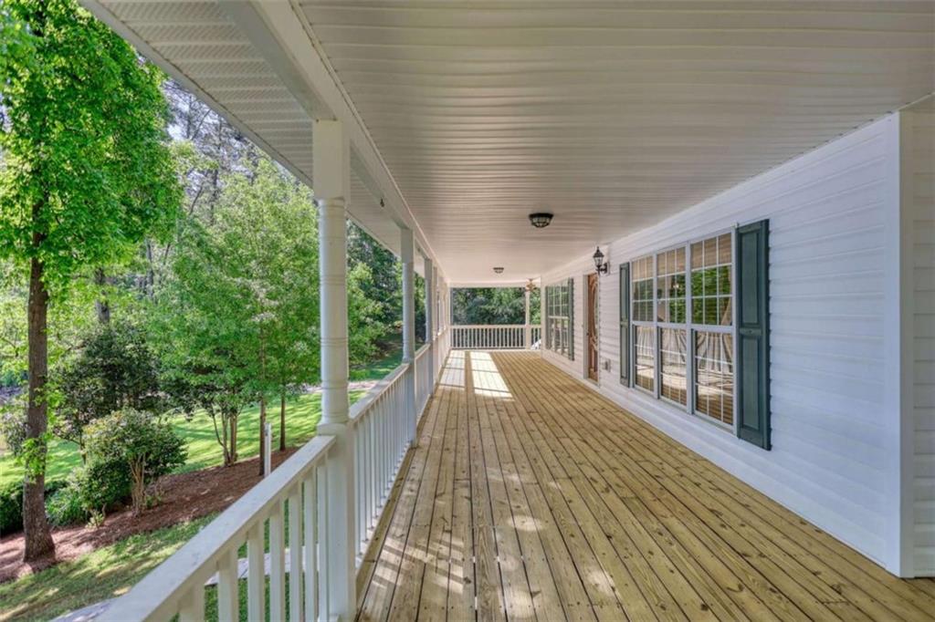 255 Old Hardy Farm Road Jackson, GA 30233 - Photo 21 of 78 a view of balcony with wooden floor and fence