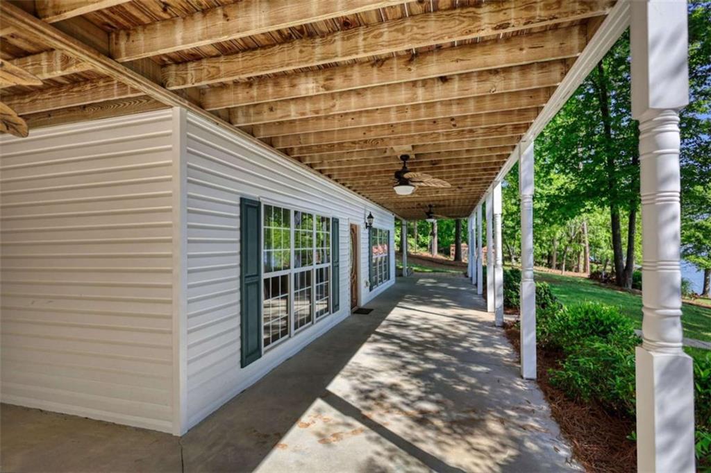 255 Old Hardy Farm Road Jackson, GA 30233 - Photo 24 of 78 a view of a porch with a patio