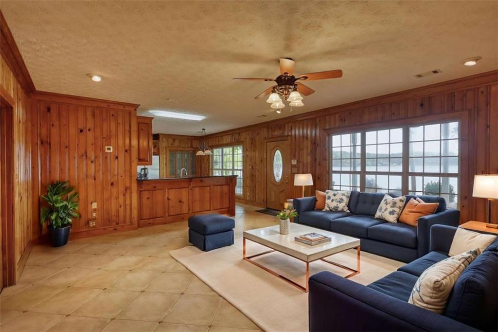 255 Old Hardy Farm Road Jackson, GA 30233 - Photo 25 of 78 a living room with furniture and a large window