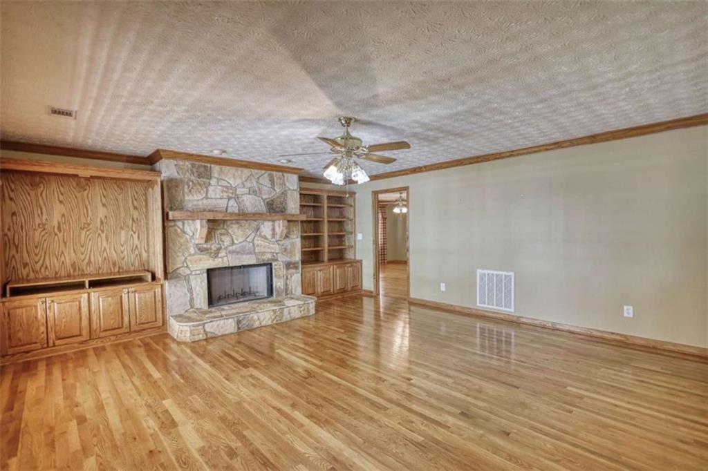 255 Old Hardy Farm Road Jackson, GA 30233 - Photo 27 of 78 a view of a livingroom with a fireplace