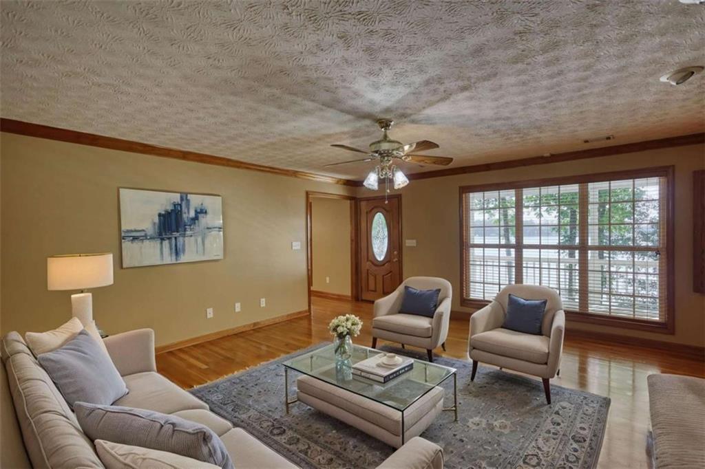 255 Old Hardy Farm Road Jackson, GA 30233 - Photo 59 of 78 a living room with furniture and a large window